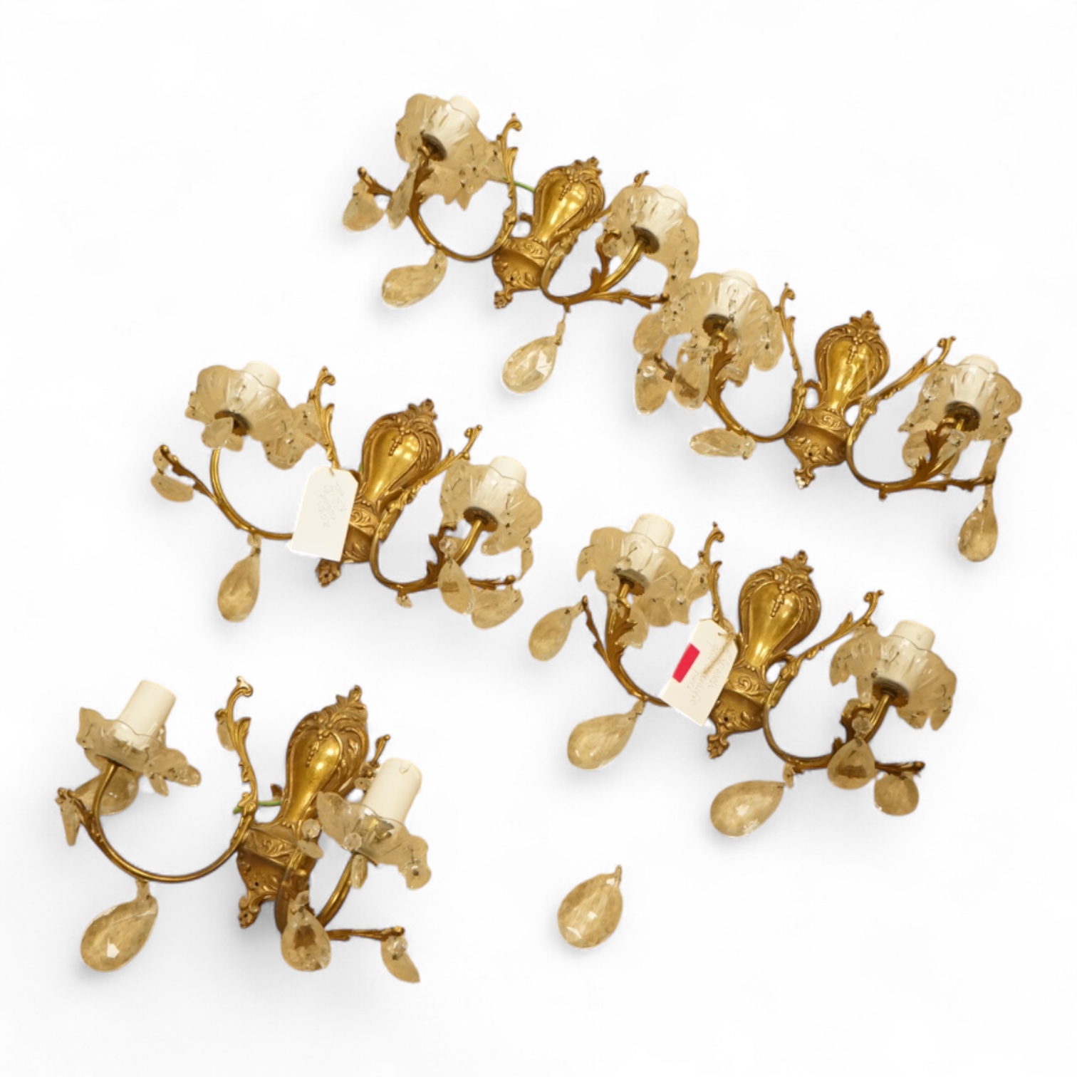 Five cast brass and glass wall lights